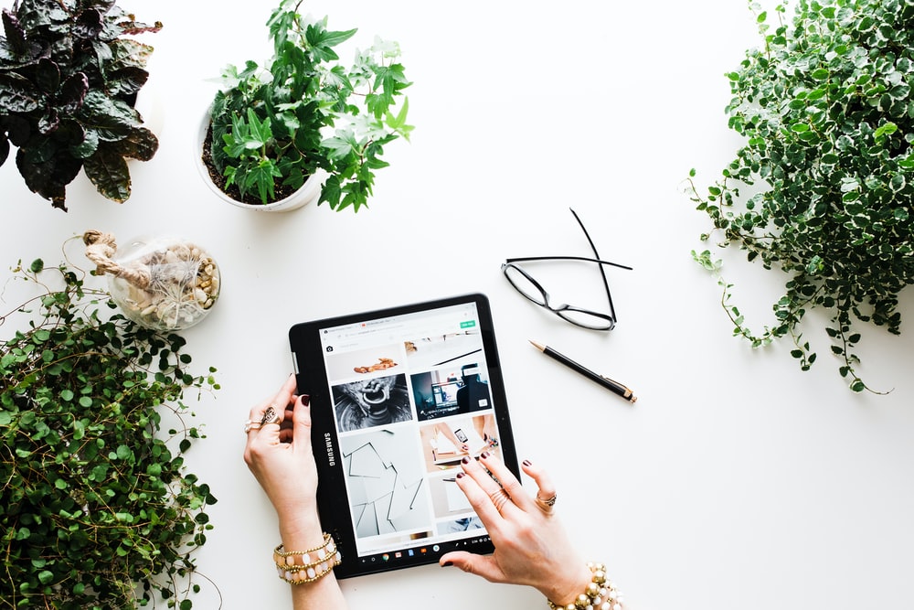 Woman using a shopping app to buy and sell items online