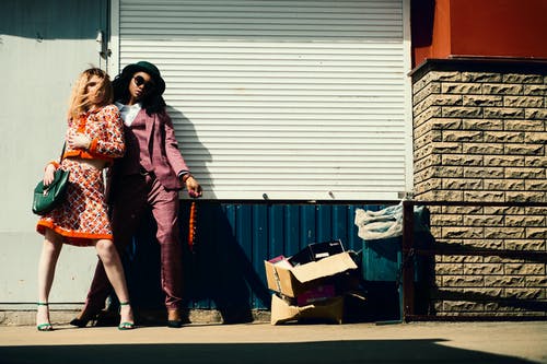 Two women wearing blazers