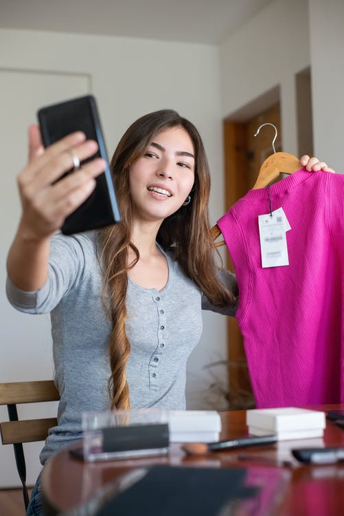 Woman selling clothes online