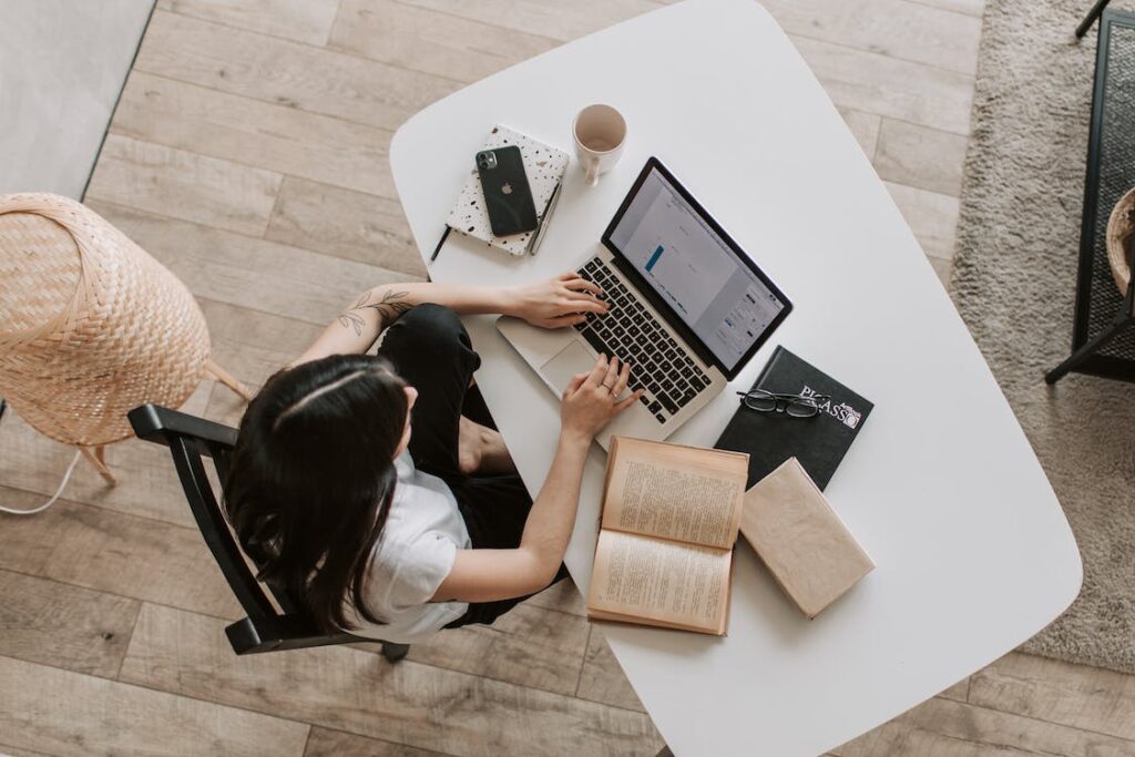 A woman working on a laptop